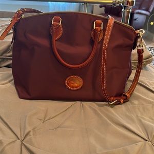 Brand new, never used bag 14” length x 9” height nylon material